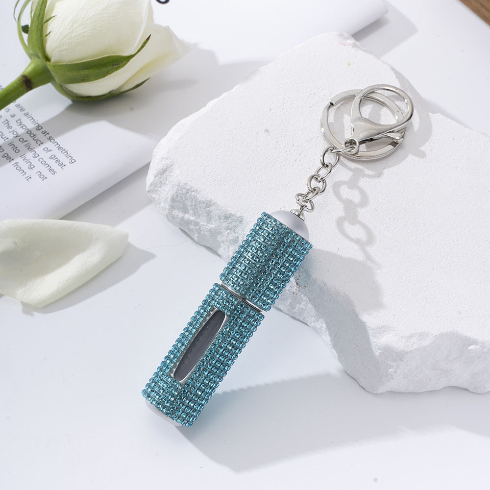 Wholesale  diamond-studded creative perfume bottle keychain is easy to carry